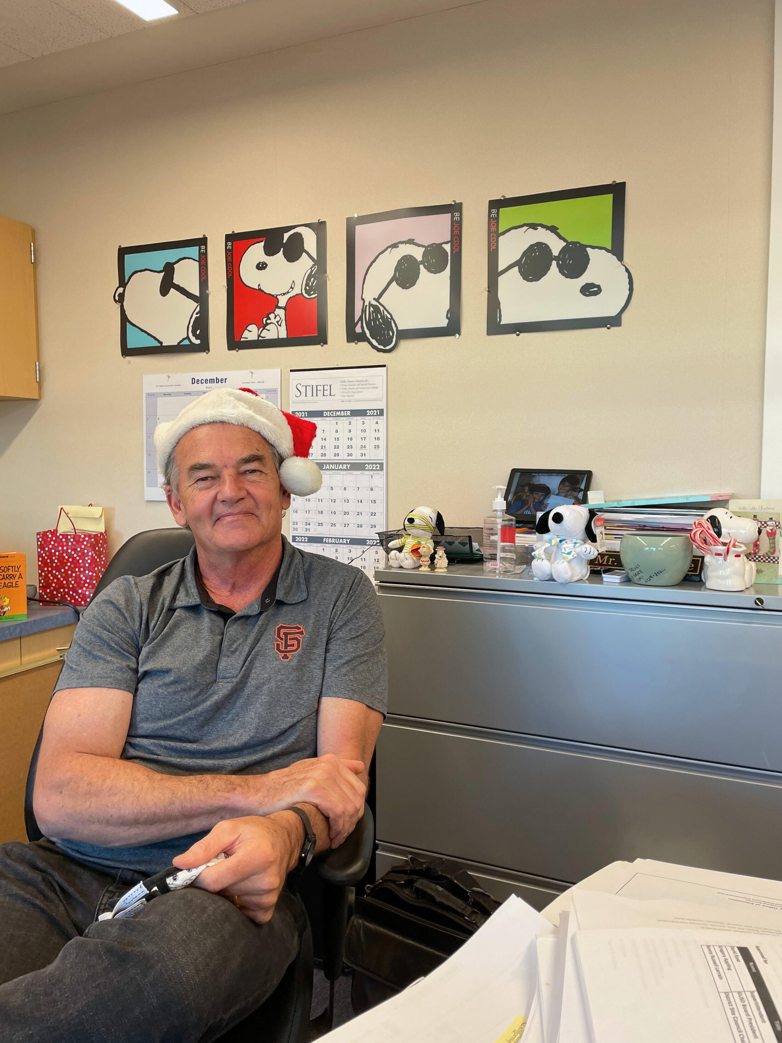 Superintendent Dave Rose wearing a Santa hat