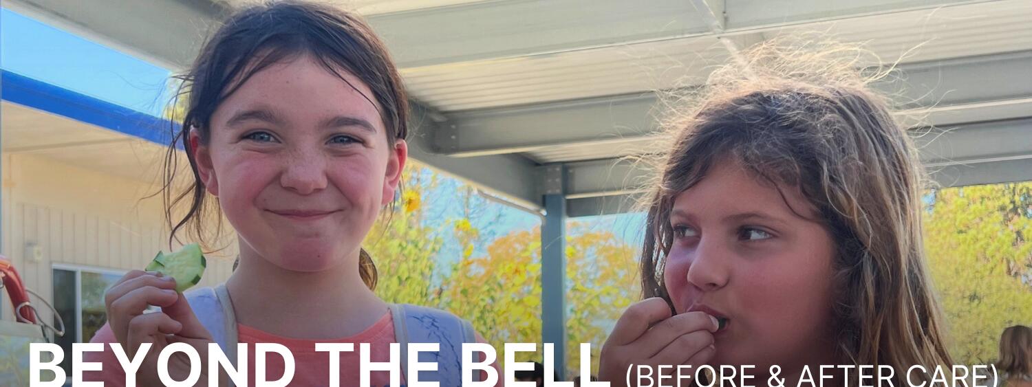 Beyond the bell banner photo of two students smiling